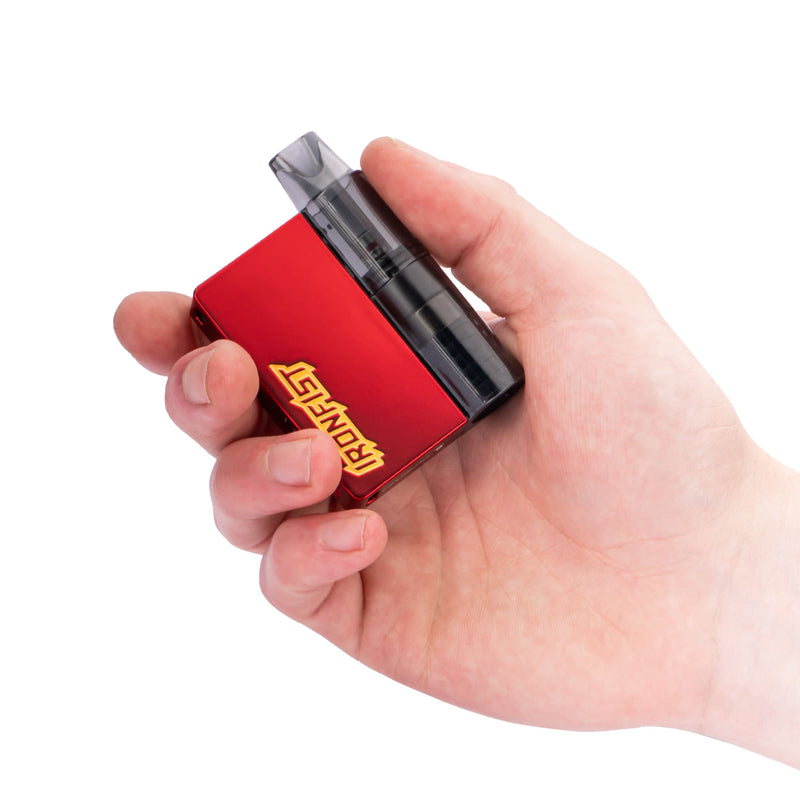 Coral Red Caliburn Iron Fist device in hand to show size of vape kit.