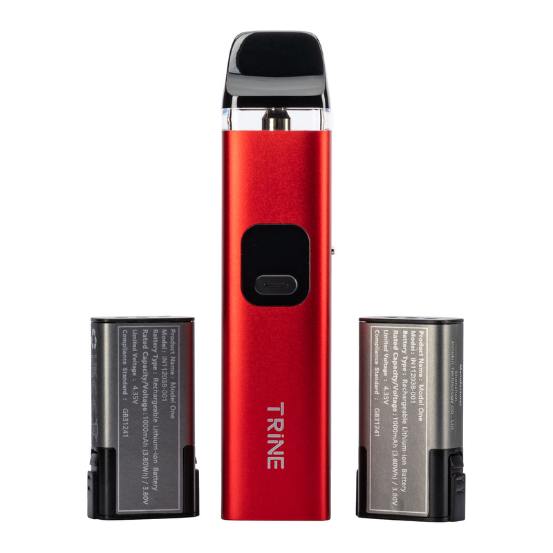 Red Innokin Trine vape kit stood up next to two individual batteries.