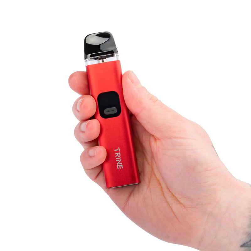 Red Innokin Trine vape kit held up in hand.